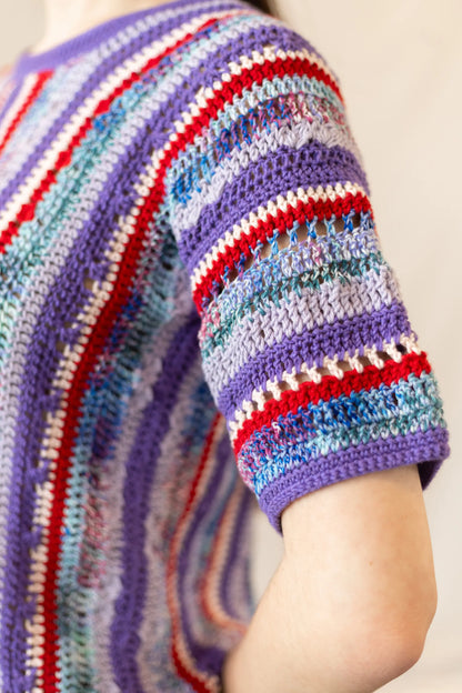 Vista detalle manga del Jersey Boreal tejido a crochet con hilo de algodón
